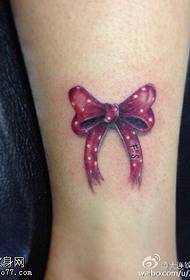 Fresh and simple bow tattoo