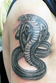 Super personalized snake tattoo on the arm