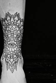 Personality black and white totem tattoo