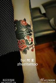 Arm black shiny leopard tattoo pattern