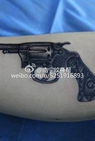 Realistic three-dimensional pistol tattoo pattern
