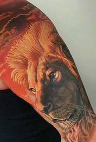 Domainering lion head arm tattoo