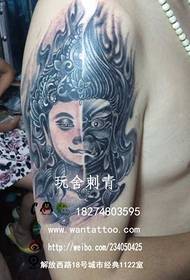Dizang Bodhisattva nga tattoo sa bukton