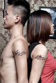 Tatuaje de tótem de brazo de pareja