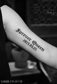 Arm English personality tattoo