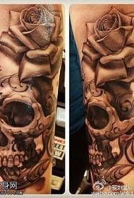 Arm classic skull rose tattoo pattern