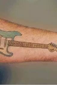 Follow the music and move the guitar tattoo