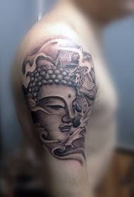 Grouss Aarm schéin Buddha Tattoo
