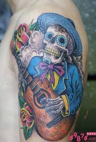Døve mand spiller guitar tatoveringsbillede af personlighedsarm