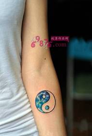 Blue gossip figure arm tattoo picture