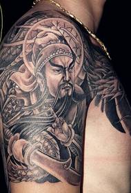 Ο Guan Gong, ο επικεφαλής του βραχίονα, τατουάζ