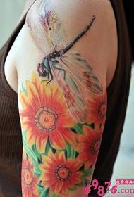 Arm squat and sunflower tattoo picture