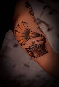 Retro gramophone arm tattoo picture