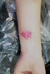 Small and beautiful diamond tattoo on the wrist