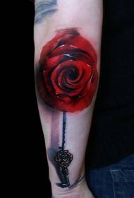 Quadre de tatuatge en clau de rosa de braç