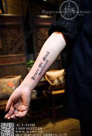 Girl gothic word arm tattoo