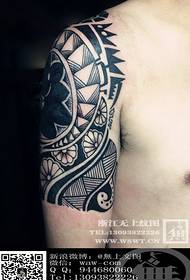 Geometric totem tattoo