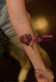 Red small diamond arm tattoo picture