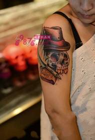 Creative literary skull arm tattoo picture