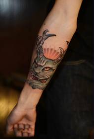 Creative stag antler cat arm tattoo picture