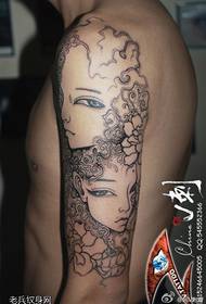 Smukt dobbeltsidet tatoveringsmønster til kvinder