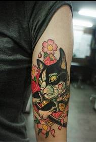 Beautiful cat color flower tattoo picture on the arm