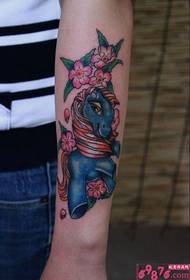 Cherry blossom pony fashion arm tattoo picture