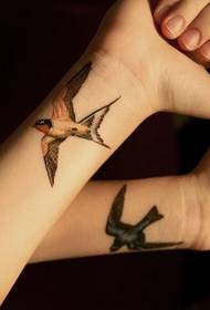 Personalized swallow tattoo picture on the arm