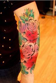 Stylish arm nice looking colorful splash rose tattoo picture