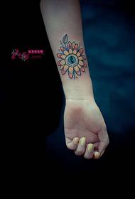 Color eye sunflower arm tattoo picture