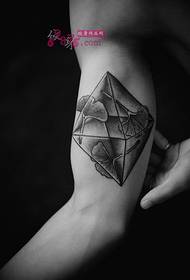 Geometric clover arm black and white tattoo