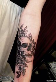 Female arm black gray personality skull tattoo pattern