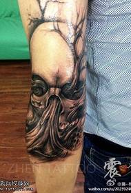 Arm svart grå skisse skalle tatoveringsmønster