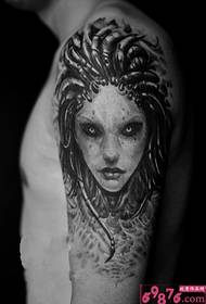 Domineering black and white Wusang Queen arm tattoo