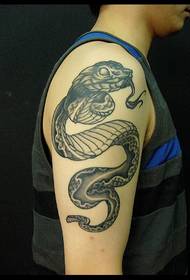 Very eye-catching snake tattoo on the big arm