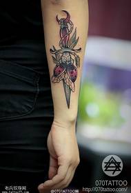 Arm beetle dagger tattoo pattern