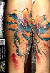 Small arm color lotus tattoo