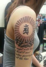 Tyttö käsivarsi Lotus sanskritinkielisen tatuointikuvan kuva