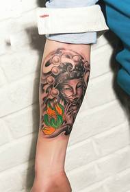 Buddha image lotus arm tattoo picture