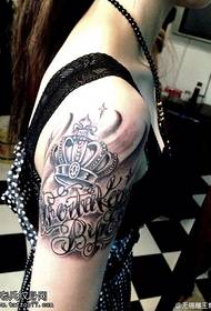 Arm crown letter tattoo pattern