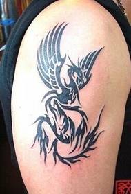 A simple phoenix totem tattoo on the upper arm