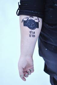 Very individual arm camera tattoo