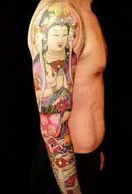 Atmospheric flower arm Buddha tattoo