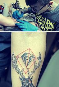 Arm creative totem fawn tattoo scene