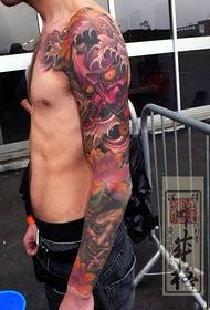 Fashionable flower arm tattoo