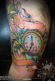 Arm inside color school clock tattoo pattern