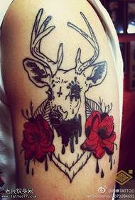 Arm antelope rose tattoo pattern