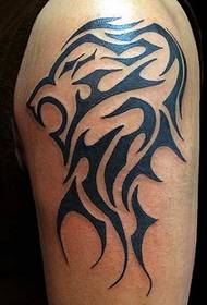 Handsome lion totem tattoo on the big arm