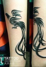 Girl arm phoenix totem tattoo