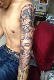 Very individual flower arm tattoo